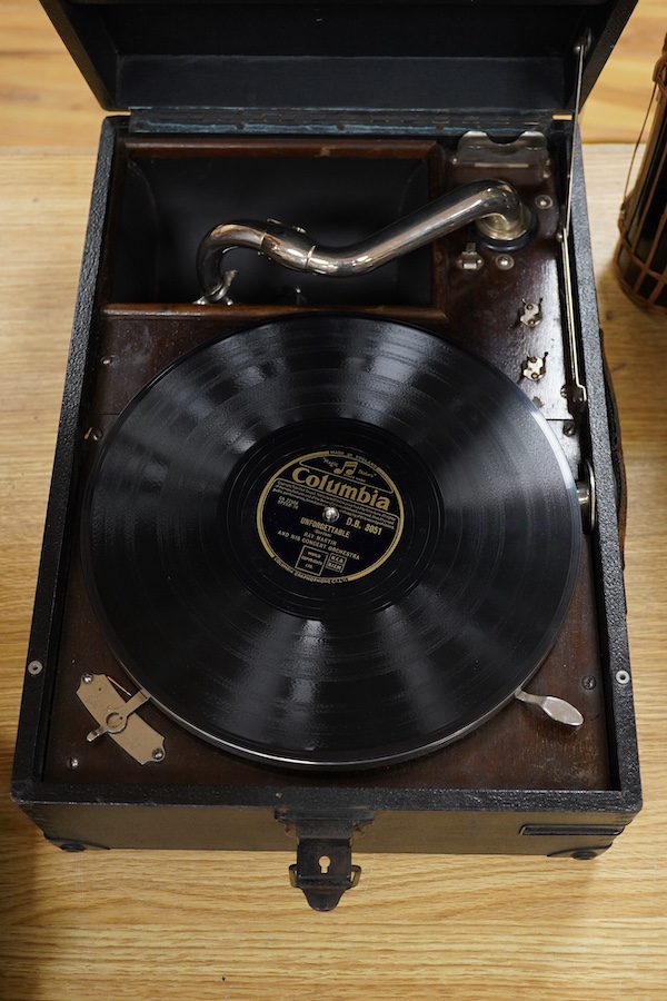 A HMV portable gramophone. Condition - currently working